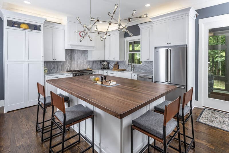 Completed Nashville kitchen with tiled backsplash and quartz countertops